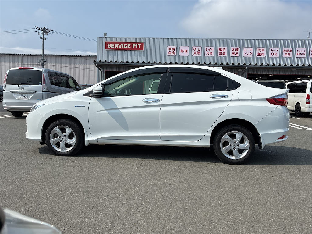 ホンダ グレイス　ﾊｲﾌﾞﾘｯﾄﾞ EX 4WD